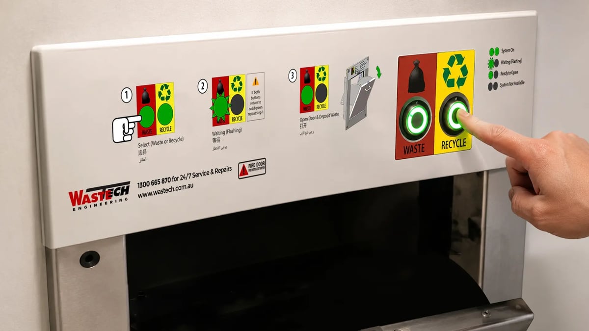 Resident selecting waste or recycling stream on a Smoothtubes diverter control panel